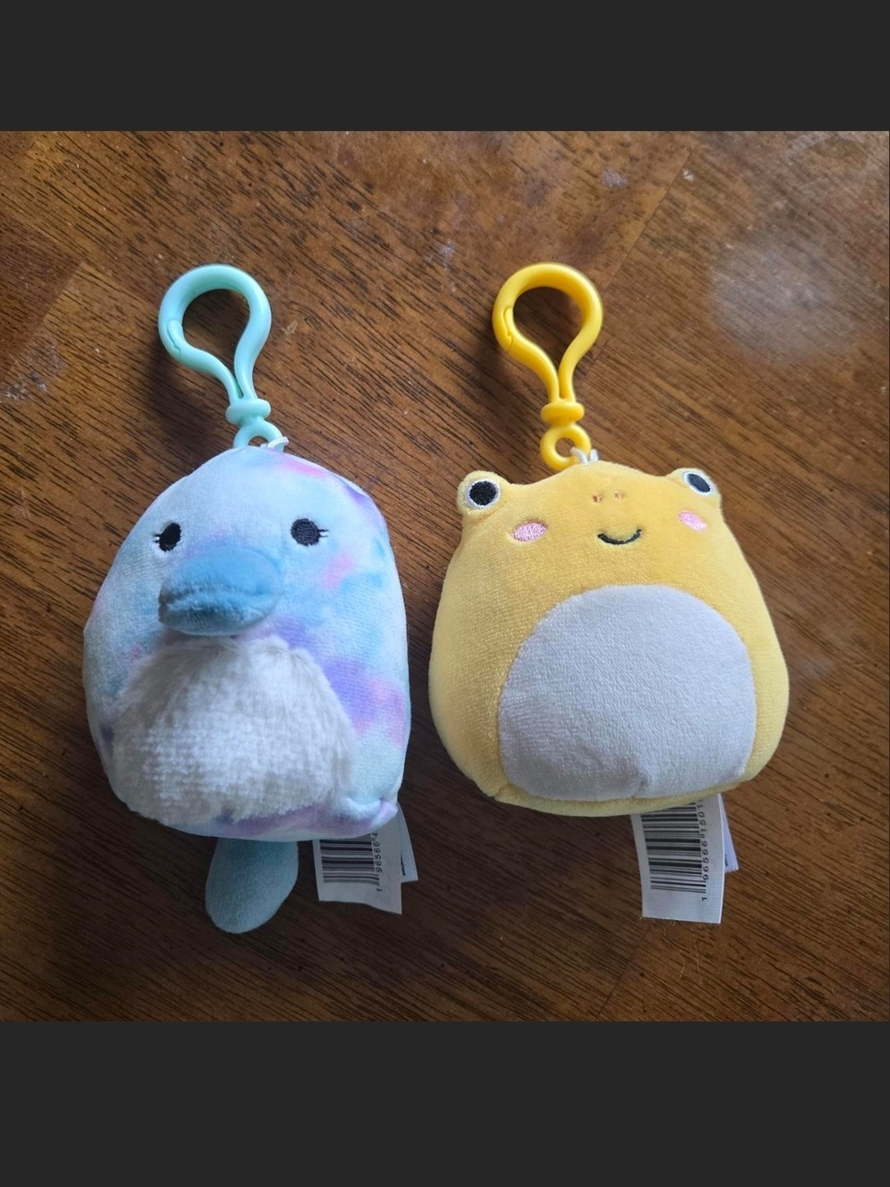 Squishmallows Clip-On Set - Blue Tie-Dye Platypus & Yellow Frog